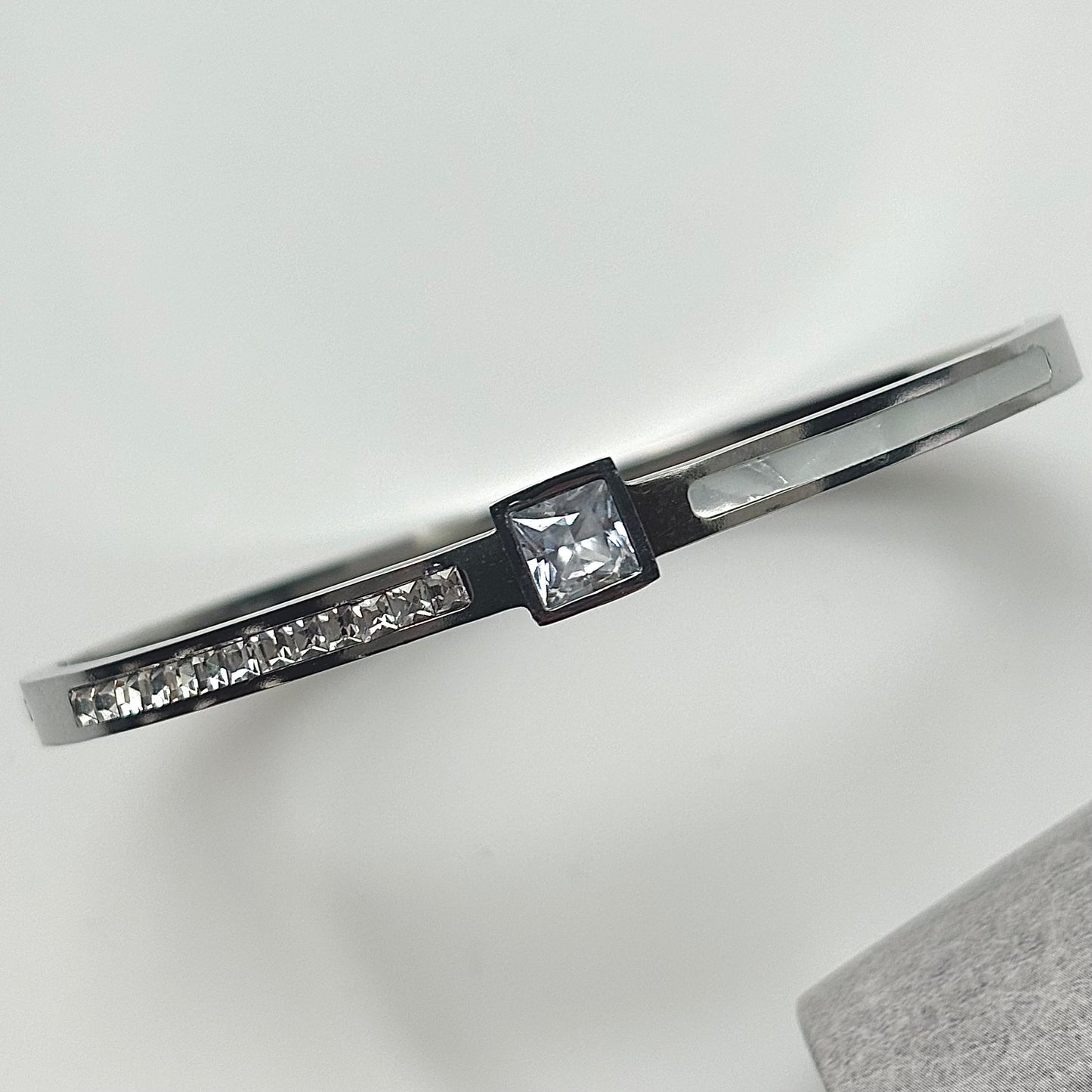 MARYbu square pave crystals and pearlescent detail stainless steel bangle