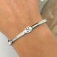 MARYbu square pave crystals and pearlescent detail stainless steel bangle